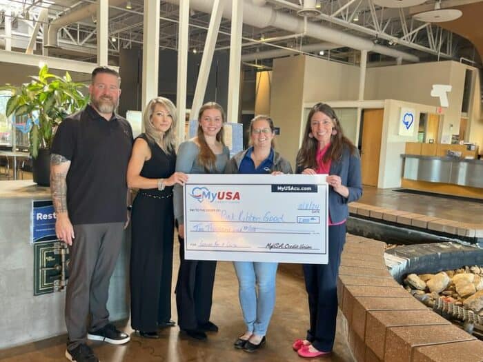 MyUSA Credit Union presenting donation check to Pink Ribbon Good in Southwest Ohio.