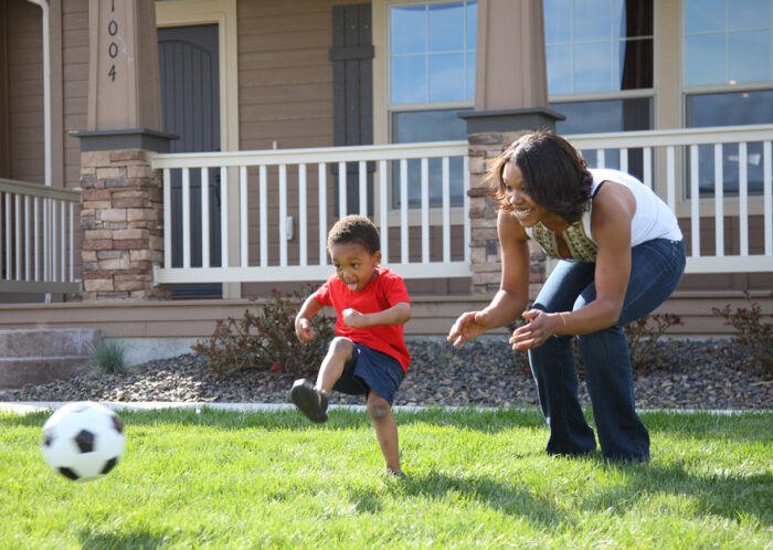 kid playing in yard